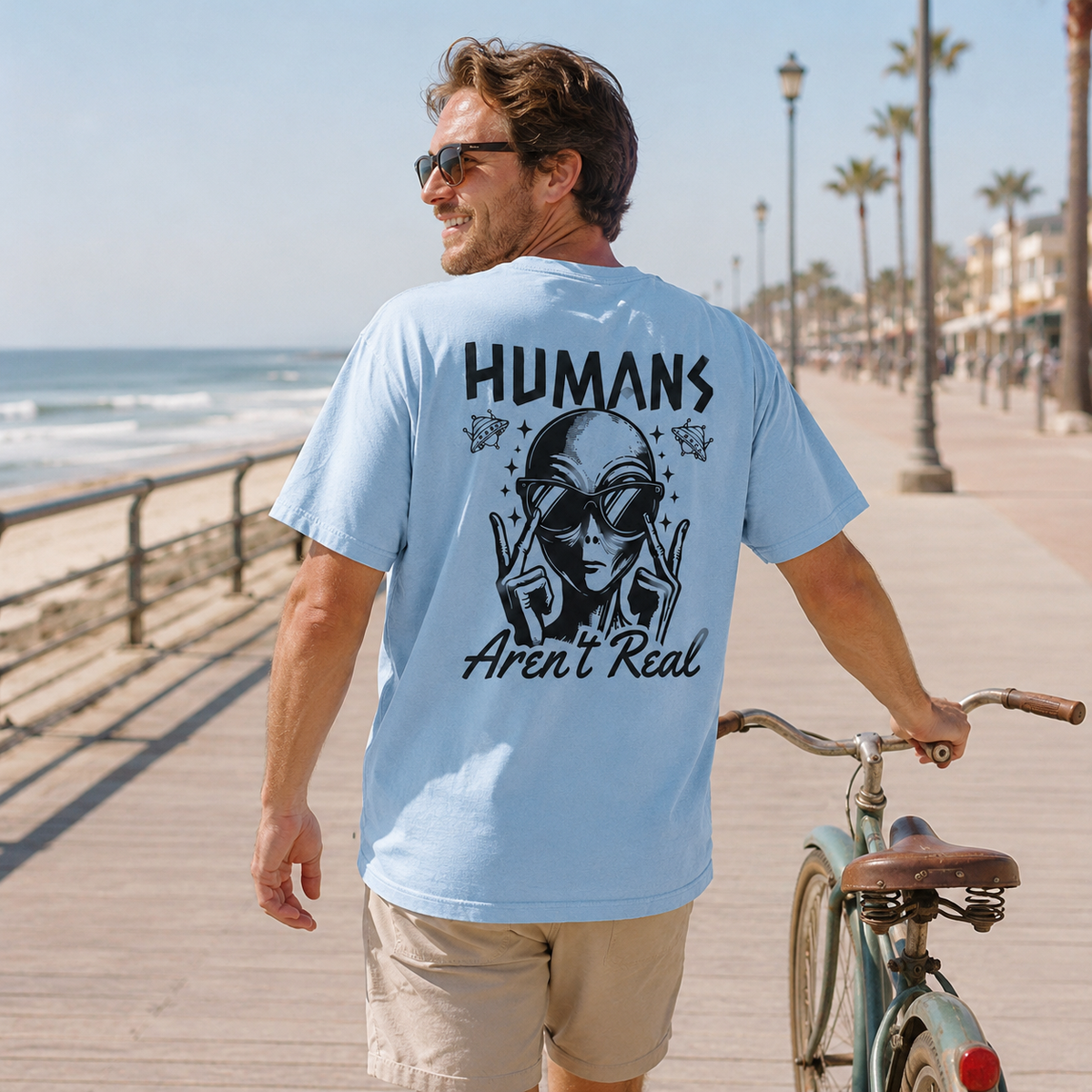 Alien Graphic T-Shirt — "Humans Aren't Real" Retro UFO Tee